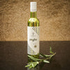 Upright bottle of Organic Olio di Puglia organic olive oil with decorative background