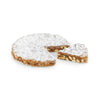 Panforte di siena with one slice cut.