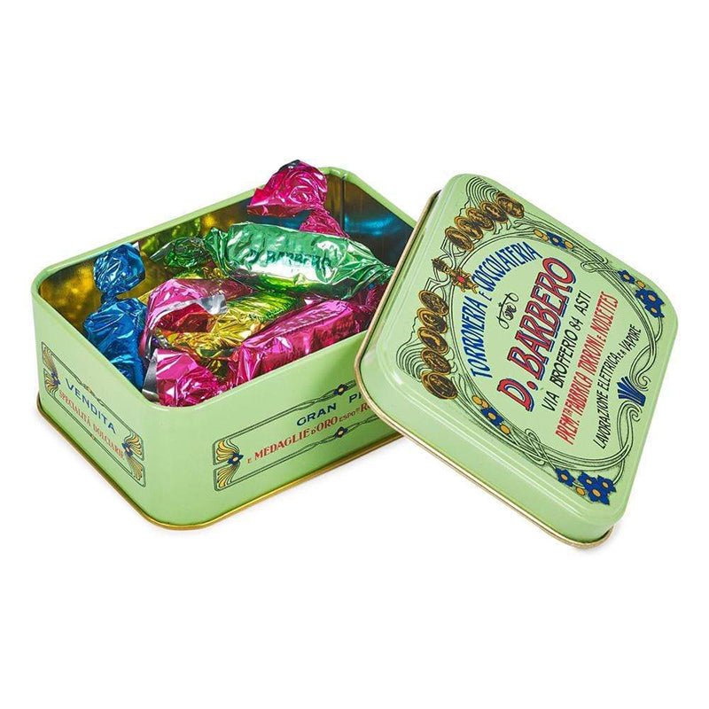 Bite-sized pieces of individually wrapped praline. Beautiful D.Barbero Italian mint green vintage style keepsake tin.