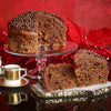 Sliced Sal de Riso Chocolate Panettone with decorative background