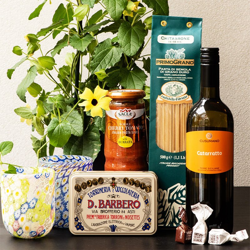 Italian foodie gift with D Barbero chocolates, PrimoGrano Pasta, Sacla' Cherry tomato Sauce and Catarratto white wine. Gift for lovers of Italian Food and confectionary. Italian ceramics and flowering pot plant.