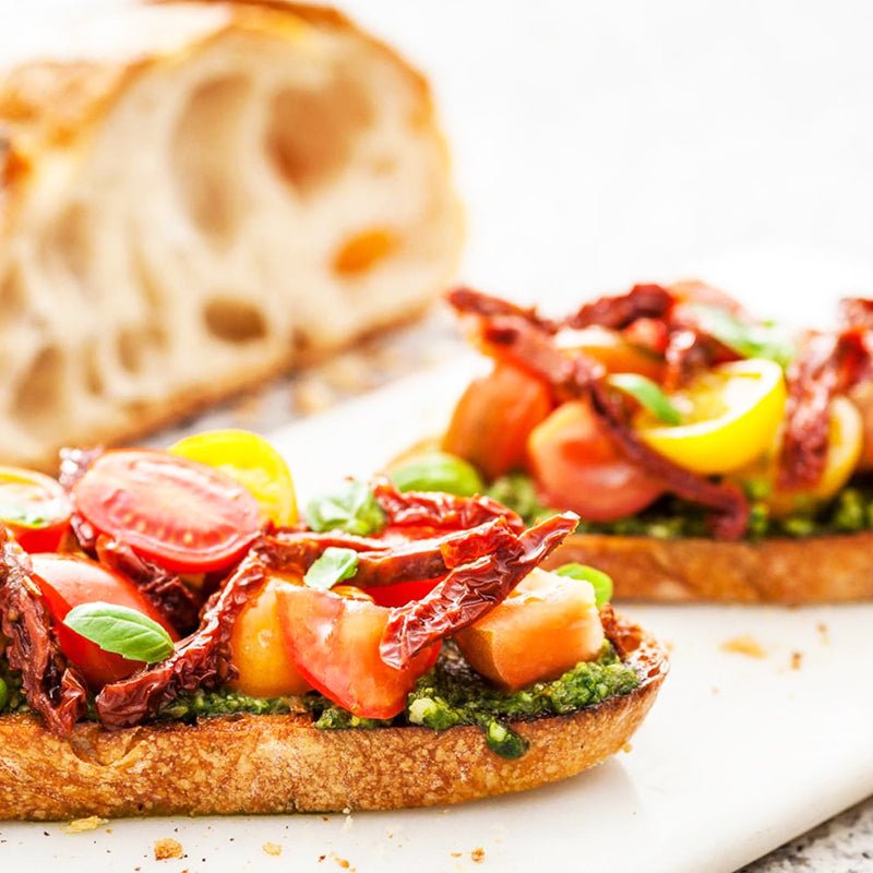 Basil Pesto Brusschetta with sun dried tomatoes