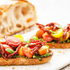 Basil Pesto Brusschetta with sun dried tomatoes